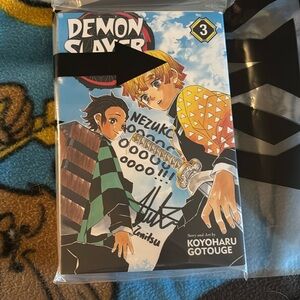 Zenitsu autographed Demon Slayer Manga